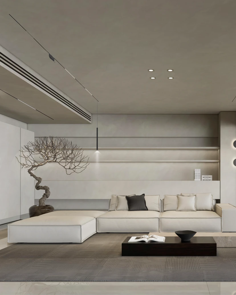 Living room with a bonsai and a low sofa under fine lines of light